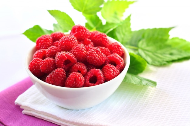 Fresh ripe raspberry in a bowl