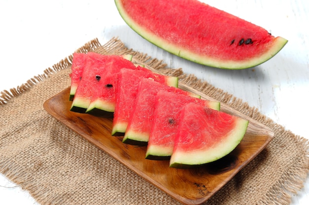 fresh ripe sliced watermelon on white background