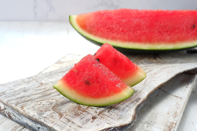 fresh ripe sliced watermelon on white background