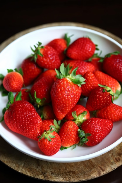 Fresh ripe strawberries in a bowl Strawberry season