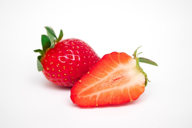 Fresh ripe strawberries isolated on white background