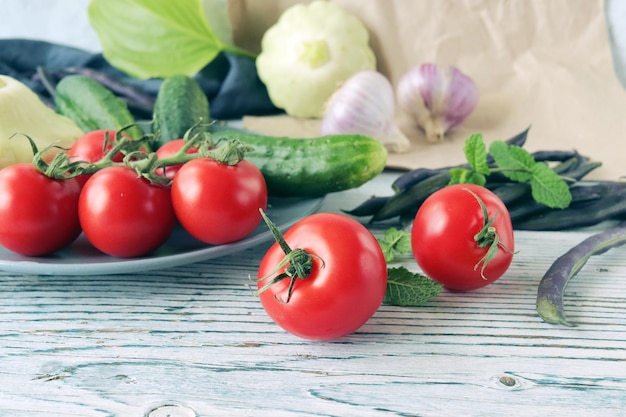 Fresh ripe variety of vegetables for cooking lunch on a wooden table organic food