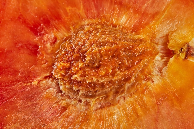 Fresh ripe yellowred plums cut in half Macro shooting