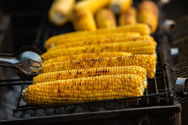 Fresh roasted or grilled corncobs. Grilled Corn for sale on the street.