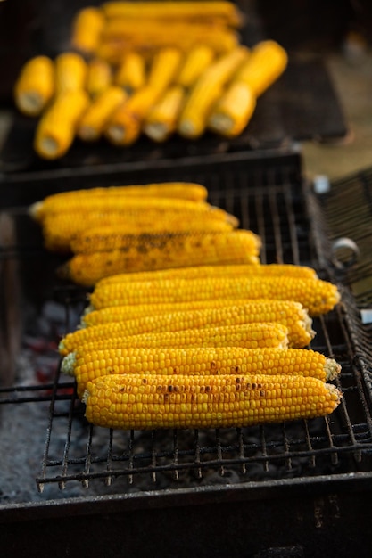 Fresh roasted or grilled corncobs. Grilled Corn for sale on the street.