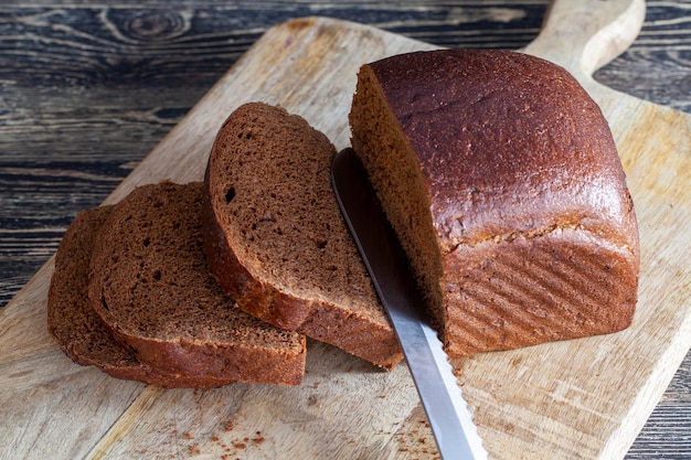 Fresh rye bread cut into pieces for sandwiches