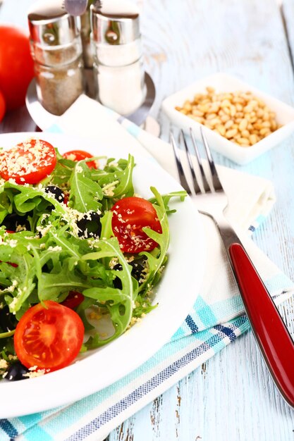 Fresh salad with arugula close up