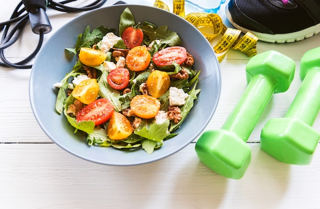 Fresh salad with tomatoes in a bowl