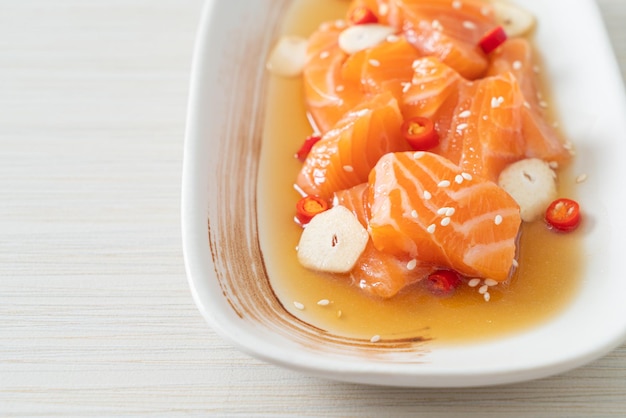 Fresh salmon raw marinated shoyu or salmon pickled soy sauce