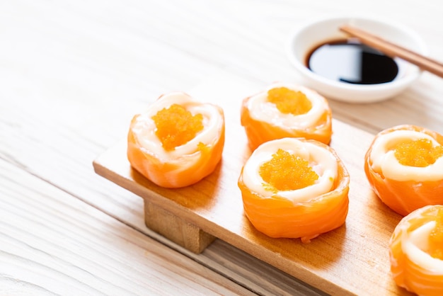 fresh salmon sushi roll with mayonnaise and shrimp egg - Japanese food style