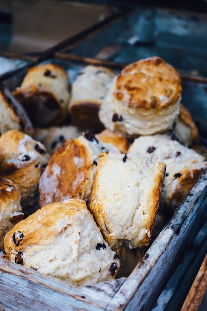 Fresh scones in a rustic wooden box.