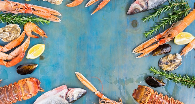 Fresh seafood on blue background