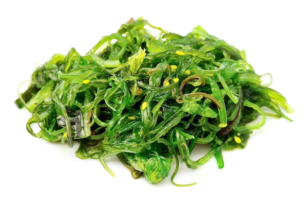 Fresh seaweed salad isolated on white. Japanese cuisine.