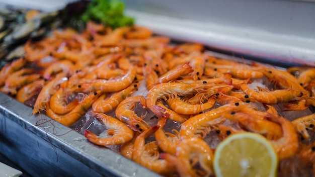 Fresh shrimps seafood on ice in buffet line at luxury restaurant