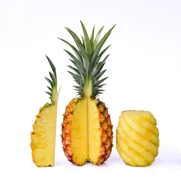 Fresh slice pineapple pieces isolated on white Closeup