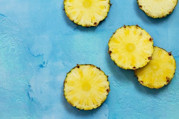 Fresh slice pineapple on stone