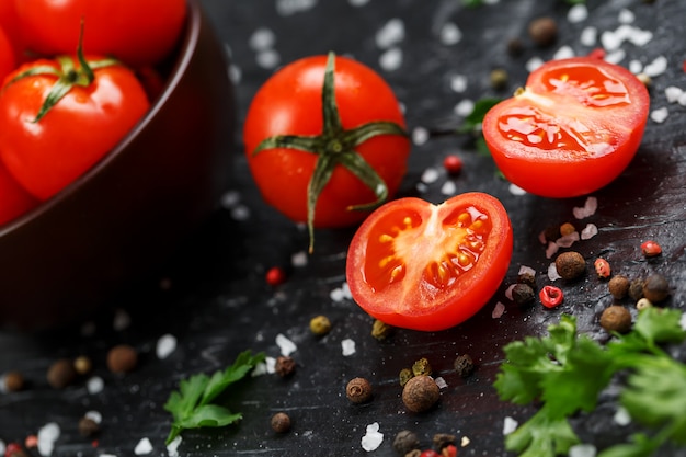 Fresh Sliced Cherry Tomatoes with spices coarse salt and herbs