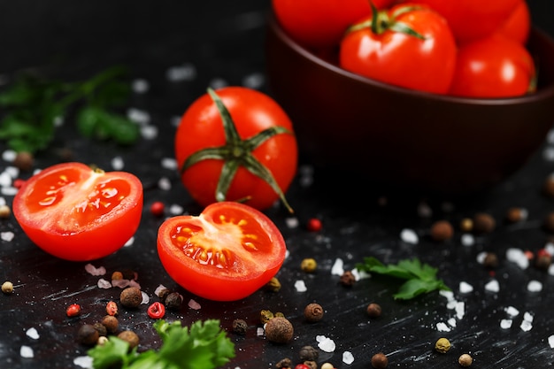 Fresh Sliced Cherry Tomatoes with spices coarse salt and herbs