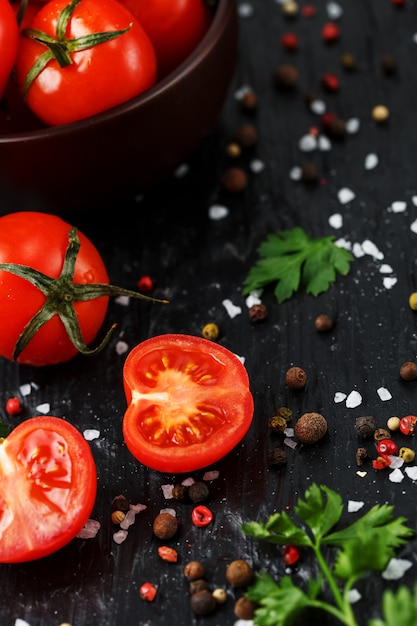 Fresh Sliced Cherry Tomatoes with spices coarse salt and herbs