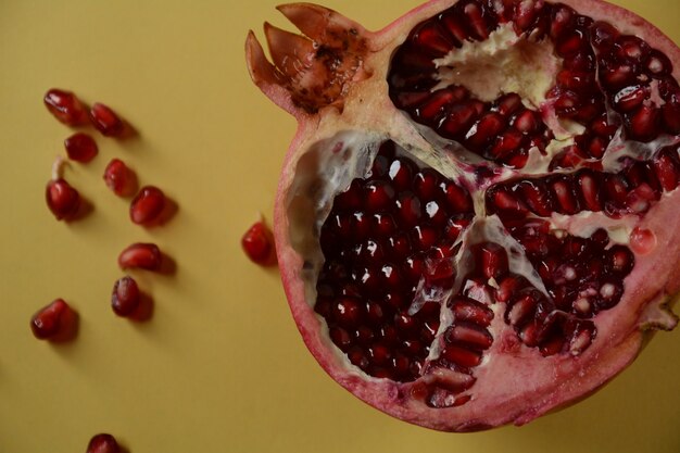 Fresh sliced pomegranates. Half pomegranate and pomegranate grains