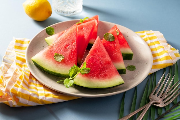 Fresh slices of red watermelon in a plate Summer fruits