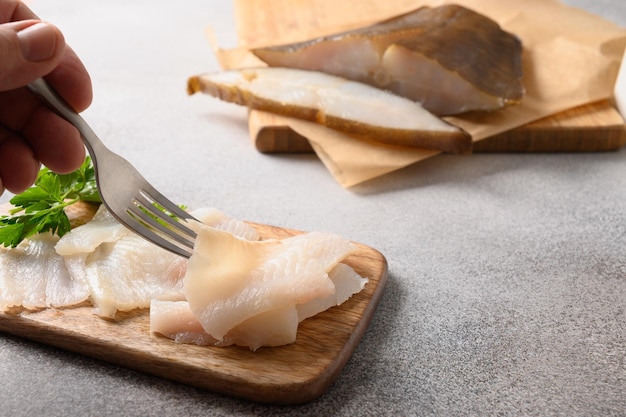 Fresh smoked halibut slices cutted View from above