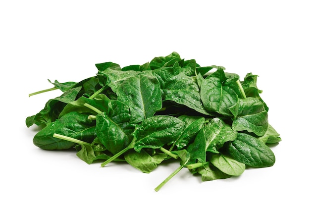 Fresh spinach leaves as background.