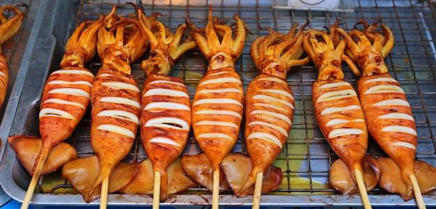 Fresh squid barbecue grilled, street food in Bangkok, Thailand