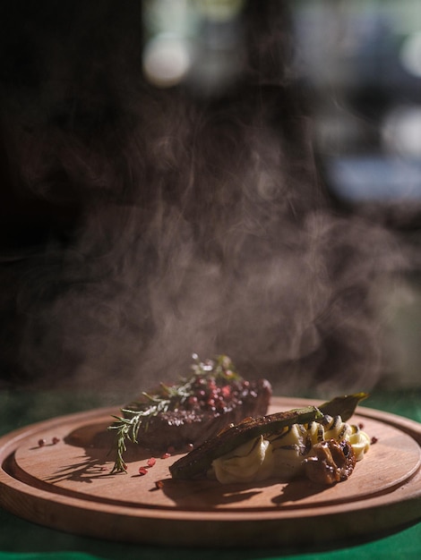 A fresh steak and vegetables on the plate