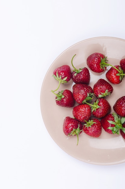 Fresh strawberries on the plate