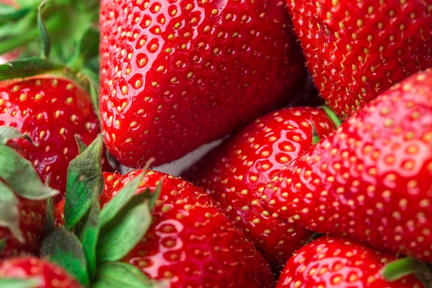 Fresh strawberry background ripe in closeup