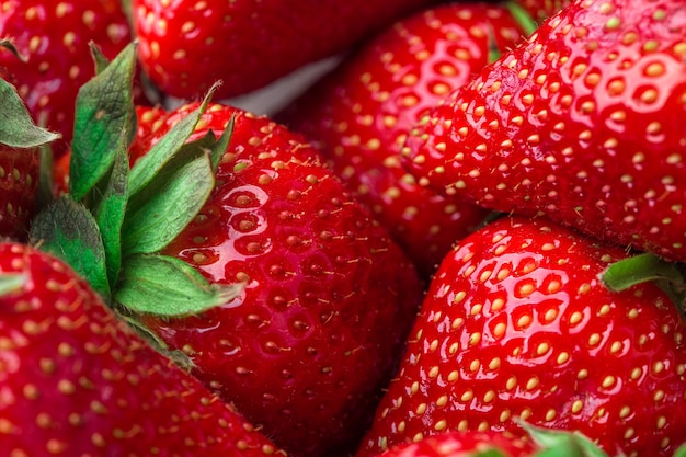 Fresh strawberry background ripe in closeup