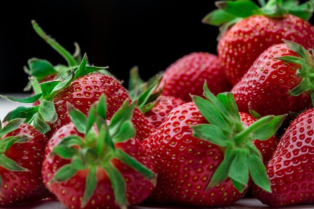 Fresh strawberry background ripe in closeup