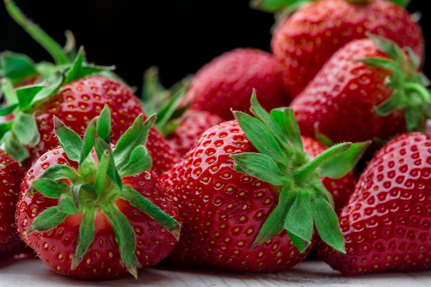 Fresh strawberry background ripe in closeup