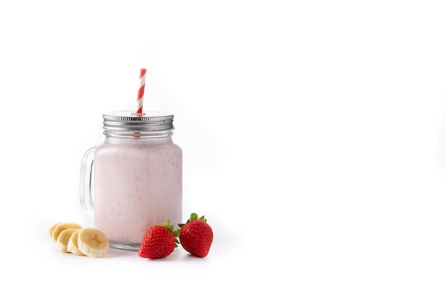 Photo fresh strawberry and banana smoothie in jar isolated on white background