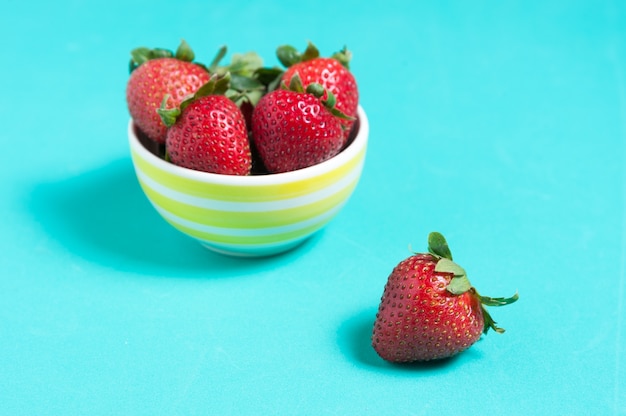 Fresh strawberry and juice on wood table. flat lay.