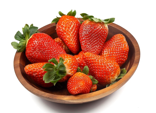 Fresh strawberry in wooden bowl on the white background Copy space