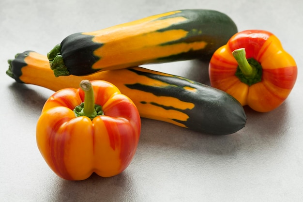 Fresh striped peppers and zucchini