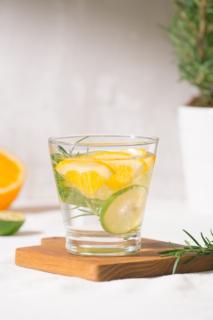 Fresh summer lemonade with citrus, orange and rosemary