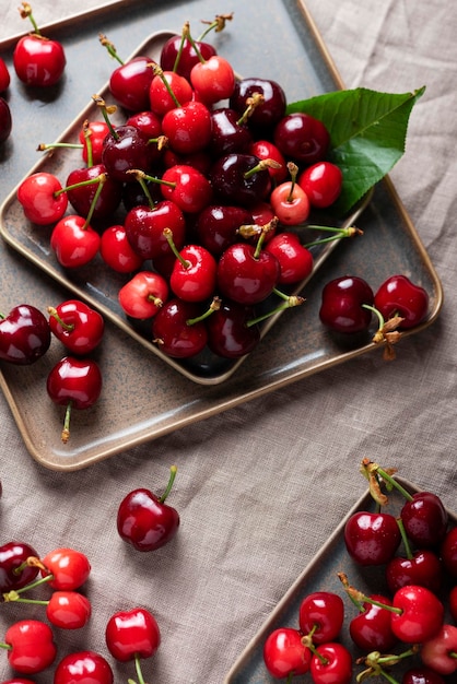 Fresh sweet cherry with green leaves