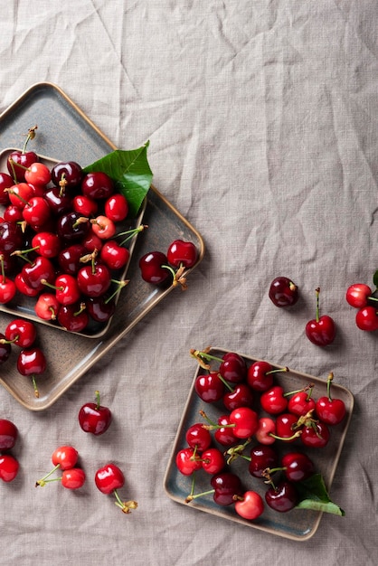 Fresh sweet cherry with green leaves