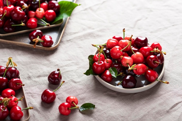 Fresh sweet cherry with green leaves