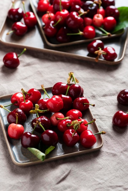 Fresh sweet cherry with green leaves