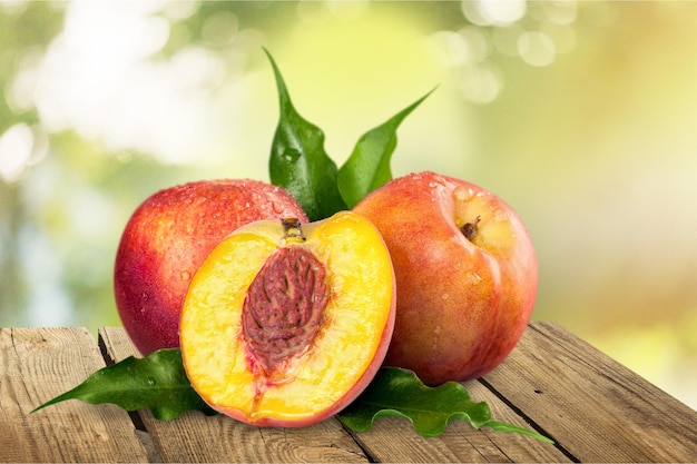 Fresh sweet peaches isolated on  background