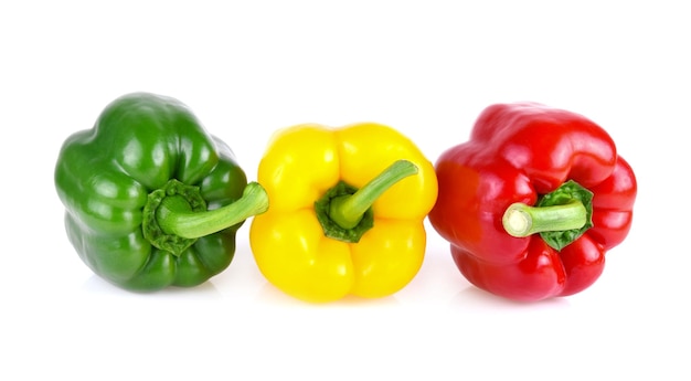 Fresh sweet pepper red green yellow paprika isolated on white background