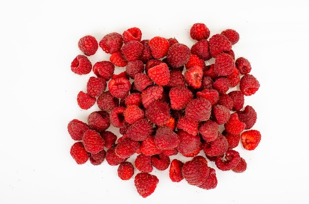 Fresh sweet ripe red raspberries. Studio Photo.