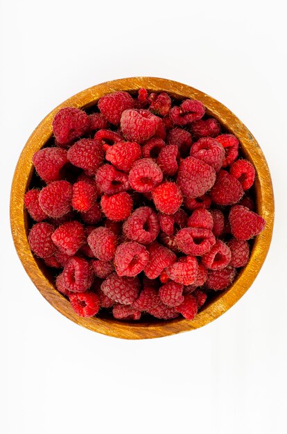 Fresh sweet ripe red raspberries. Studio Photo.