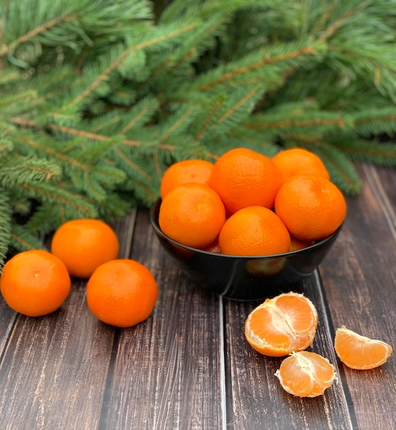 Fresh tangerines on wooden table, closeup. banner for Christmas and New Year