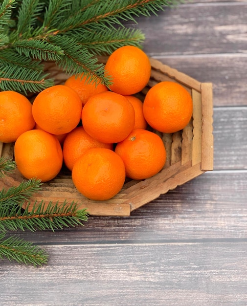 Fresh tangerines on wooden table, closeup. banner for Christmas and New Year