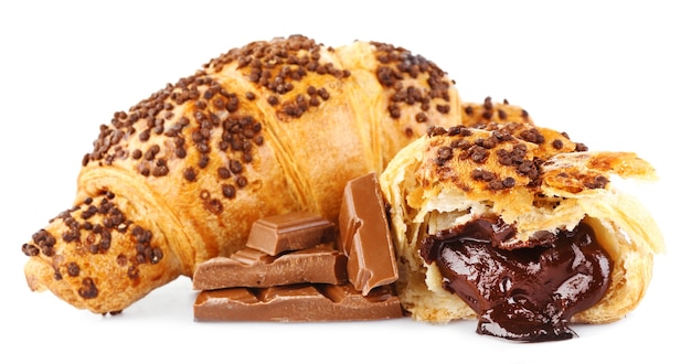 Fresh and tasty croissants with chocolate isolated on white